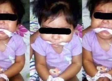 תמונות של תינוקת עם ידיים ופה קשורים הפכו ויראליות, ואז המשטרה גילתה מי עשה לה את זה…